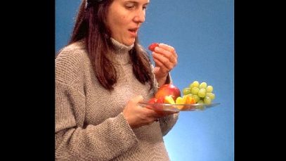 ImaNutrition in pregnancy pregnant woman eating strawberries grapesge from pixnio.com