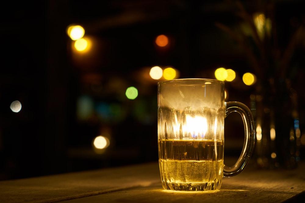 clear glass mug with water